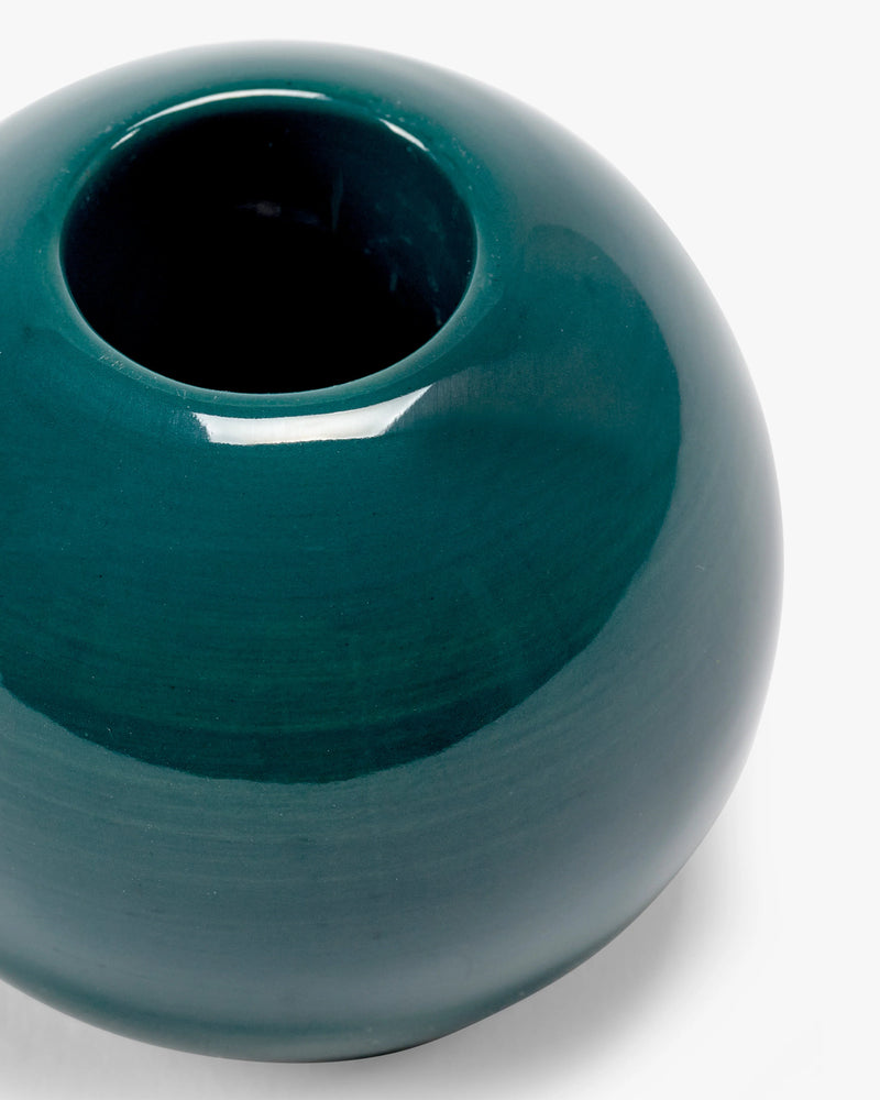 Portavelas cerámico azul verdoso, forma redondeada con abertura circular