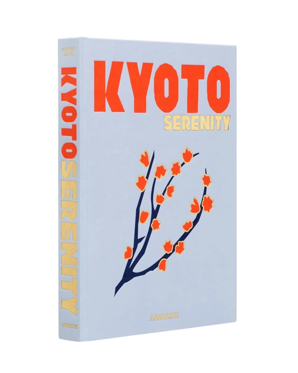 Libro Kyoto Serenity con portada azul clara, texto KYOTO y flores naranjas