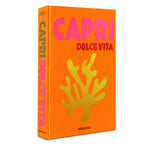 Libro Capri Dolce Vita visto de lado; lomo con texto vertical y portada naranja