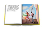 Libro de fotografía abierto con pareja bailando al aire libre y vestido multicolor