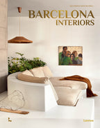 Barcelona interiors book cover with large title text and cozy living-room scene