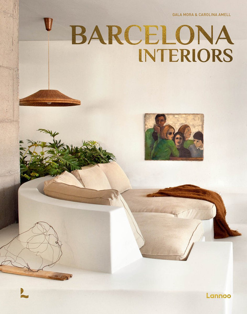 Barcelona interiors book cover with large title text and cozy living-room scene