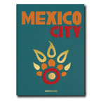 Libro Ciudad de México con portada azul turquesa, texto MEXICO CITY y emblema colorido