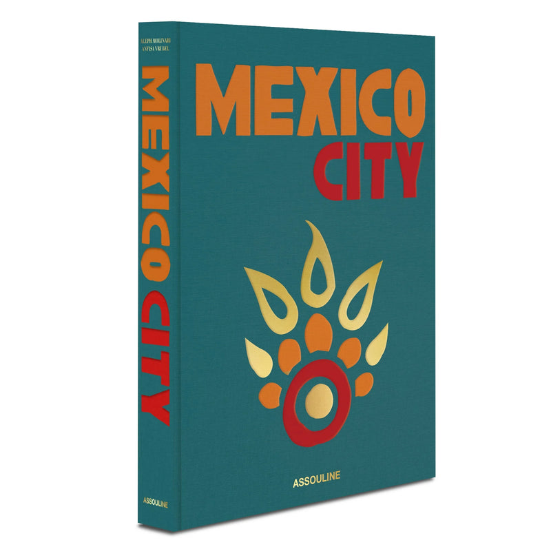 Libro Ciudad de México abierto en vertical: portada azul con texto MEXICO CITY y emblema