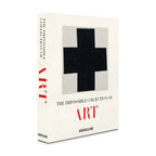 Libro de arte de tapa crema con cruz negra, vista lateral, logotipo Assouline