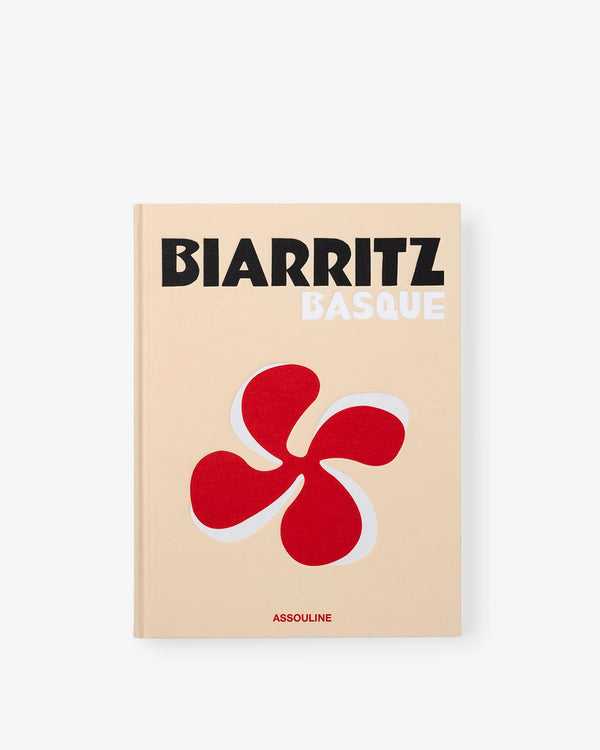 Libro Biarritz Vasca, tapa beige con BIARRITZ BASQUE y flor roja con borde blanco.