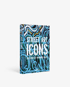 Libro de arte urbano con portada de grafiti azul y letras grandes blancas.