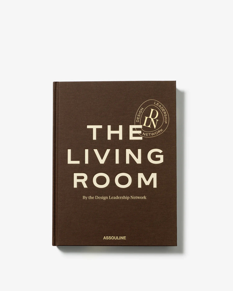 Libro Sala de estar de tapa marrón con letras grandes y logotipo circular.