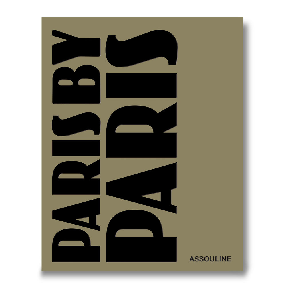 Libro de tapa dura con portada beige y letras negras “Paris”.