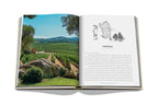 Libro abierto con viñedos en laderas y sección titulada SARDINIA