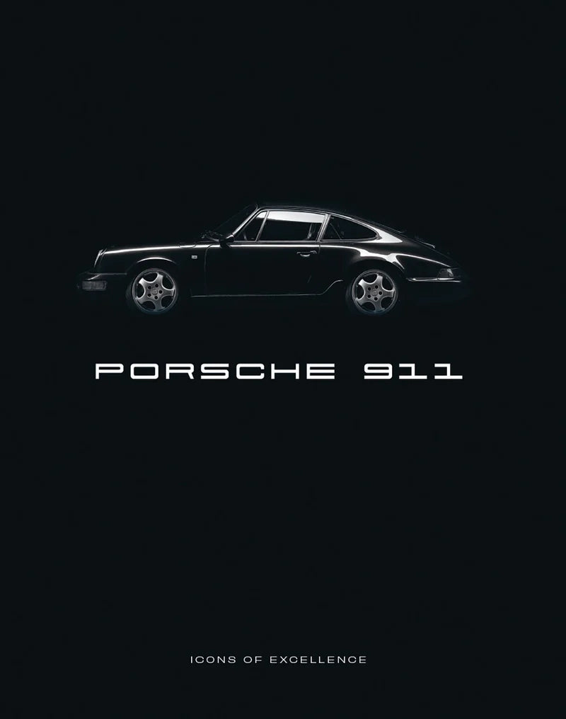 Libro Porsche 911 de colección, portada oscura con auto y “PORSCHE 911”