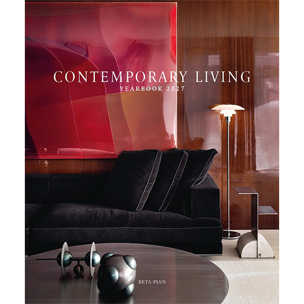 Libro de portada roja con texto «CONTEMPORARY LIVING» y «YEARBOOK 2027».