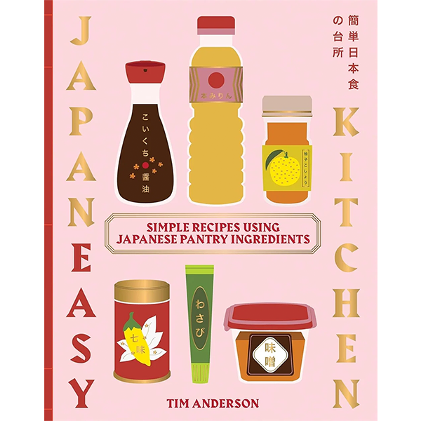 Libro de cocina japonesa con portada ilustrada de ingredientes y título en letras doradas