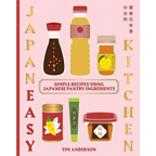 Libro de cocina japonesa con portada ilustrada de ingredientes y título en letras doradas