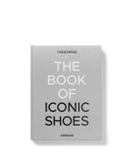 Libro Fashionphile de Assouline, tapa gris con THE BOOK OF ICONIC SHOES