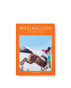 Libro Wellington de Assouline, portada naranja con caballo y jinete.
