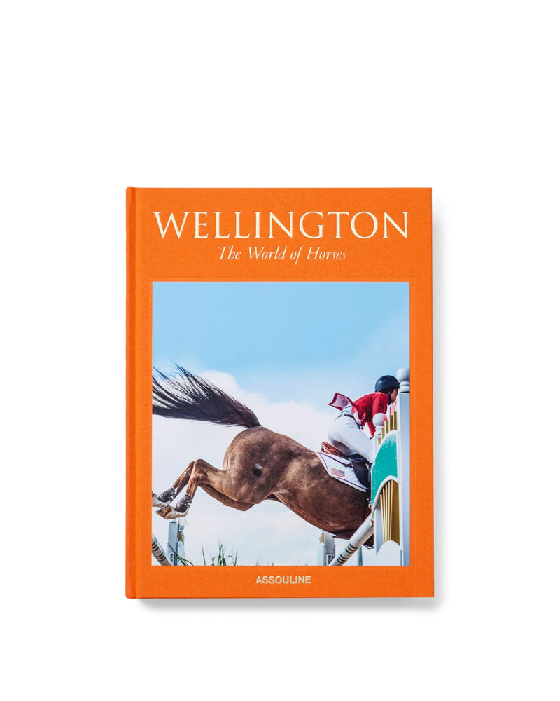 Libro Wellington de Assouline, portada naranja con caballo y jinete.