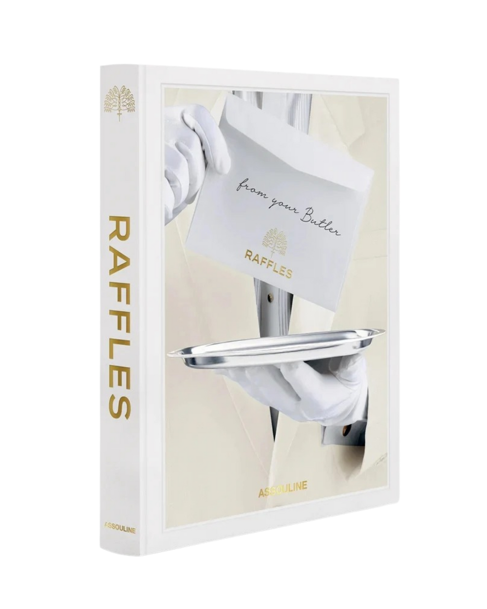 Libro Raffles de Assouline con portada blanca, bandeja metálica y detalle dorado