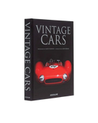 Libro de coches clásicos Assouline en caja, portada negra con auto rojo