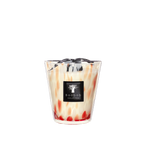 Vela aromática en vaso de vidrio con patrón coral y naranjas y etiqueta Baobab Collection