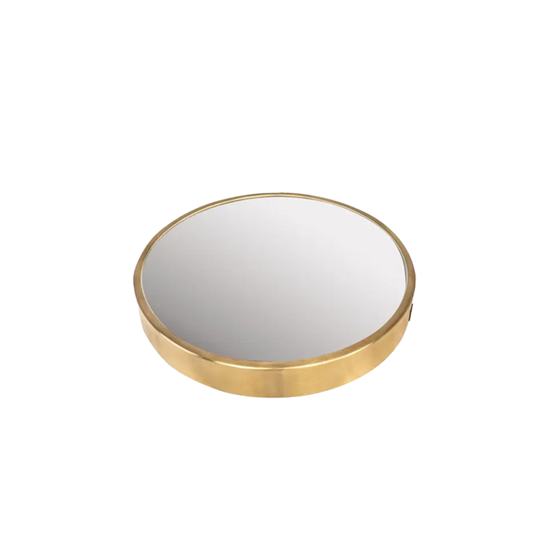 Espejo circular dorado con marco delgado y reflejo en vista inclinada